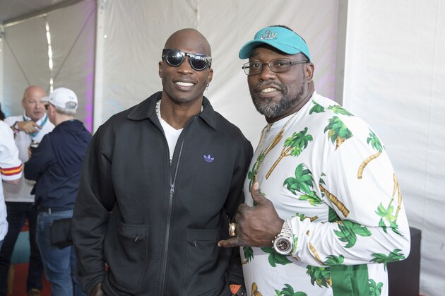 IMAGE DISTRIBUTED FOR THE PLAYERS TAILGATE - From left, Ex-NFL players Chad Johnson, and Warren Sapp, pose at The Players Tailgate at Super Bowl LIV on Sunday, Feb. 2, 2020, in Miami. (Jeff Lewis/AP Images for The Players Tailgate)