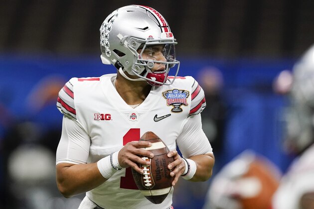 Ohio State quarterback Justin Fields warms up before the Sugar Bowl NCAA college football game against Clemson Friday, Jan. 1, 2021, in New Orleans. (AP Photo/John Bazemore)