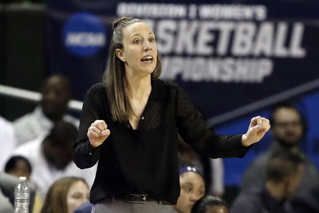 FILE - In this March 23, 2019, file photo, California head coach Lindsay Gottlieb instructs her team in the first half of a first round women's college basketball game in the NCAA Tournament, in Waco, Texas. The Cavaliers have hired former California coach Lindsay Gottlieb as an assistant on John Beilein’s staff. Gottlieb joins Beilein’s staff after serving eight years as the University of California, Berkeley women's basketball head coach, where she led the Golden Bears to a combined 179-89 (.668) record (86-58, .597 in Pac-12) since taking over the helm in 2011-12.  (AP Photo/Tony Gutierrez, File)