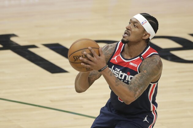 Washington Wizards' Bradley Beal pulls up for a shot during the first half of an NBA basketball game against the Milwaukee Bucks Wednesday, May 5, 2021, in Milwaukee. (AP Photo/Aaron Gash)