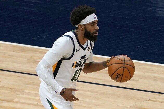 Utah Jazz's Mike Conley (10) plays in an NBA basketball game against the Minnesota Timberwolves, Monday, April 26, 2021, in Minneapolis. (AP Photo/Jim Mone)