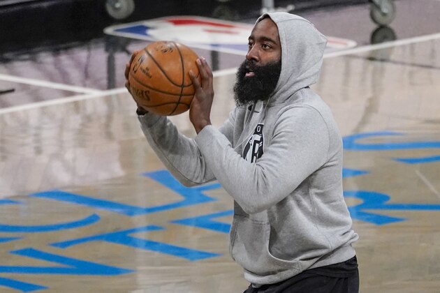 Brooklyn Nets guard James Harden warms up before the start of an NBA basketball game against the Charlotte Hornets, Friday, April 16, 2021, in New York. (AP Photo/Mary Altaffer)