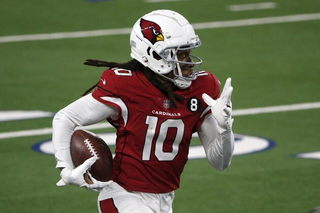 Arizona Cardinals wide receiver DeAndre Hopkins (10) gains yardage after catching a pass in the second half of an NFL football game against the Dallas Cowboys in Arlington, Texas, Monday, Oct. 19, 2020. (AP Photo/Michael Ainsworth)