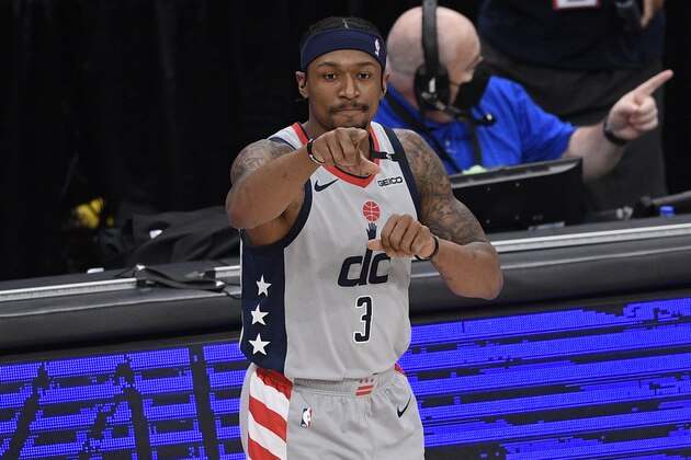 Washington Wizards guard Bradley Beal (3) gestures before an NBA basketball game against the Golden State Warriors, Wednesday, April 21, 2021, in Washington. (AP Photo/Nick Wass)