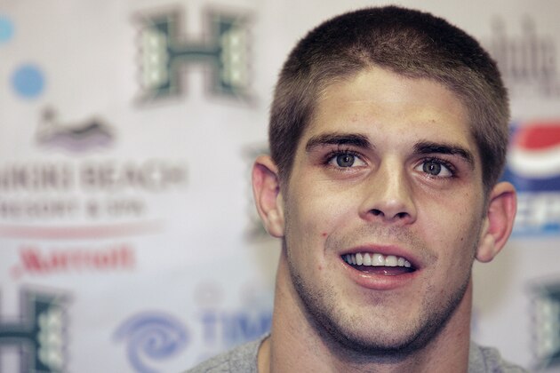 Hawaii quarterback Colt Brennan speaks to the media at the Stan Sheriff Center after being named a Heisman finalists, Wednesday,  Dec. 5, 2007 in Honolulu.  Brennan, along with two other quarterbacks and a running back are the four finalists for this year's Heisman Trophy.  Brennan finished the regular season with 4,174 yards in passing and 38 touchdowns while setting the major college record for career touchdown passes with 131.(AP Photo/Marco Garcia)