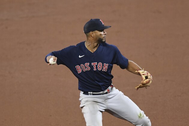 Boston Red Sox shortstop Xander Bogaerts throws out Baltimore Orioles Maikel Franco during the eighth inning of a baseball game on Monday, May 10, 2021, in Baltimore. (AP Photo/Terrance Williams)
