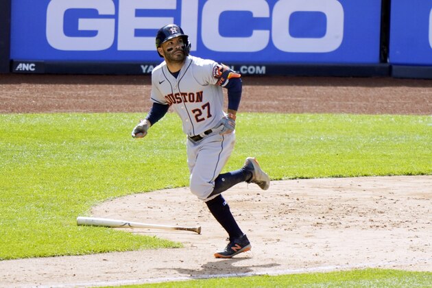 Houston Astros' Jose Altuve (27) watches his eighth-inning, three-run, home run as he trots the base path in a baseball game against the New York Yankees, Thursday, May 6, 2021, at Yankee Stadium in New York. (AP Photo/Kathy Willens)