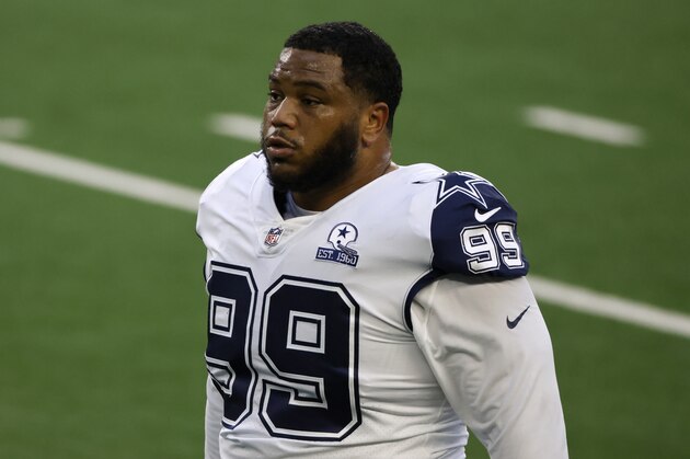 Dallas Cowboys' Antwaun Woods (99) warms up before an NFL football game against the Washington Football Team in Arlington, Texas, Thursday, Nov. 26, 2020. (AP Photo/Ron Jenkins)