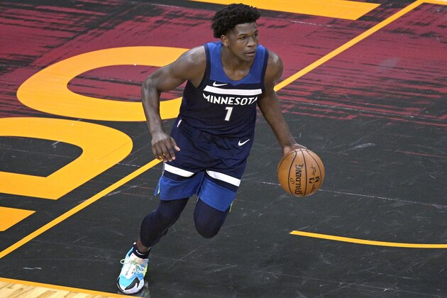 Minnesota Timberwolves forward Anthony Edwards (1) pushes the ball up the court during the first half of an NBA basketball game against the Orlando Magic, Sunday, May 9, 2021, in Orlando, Fla. (AP Photo/Phelan M. Ebenhack)