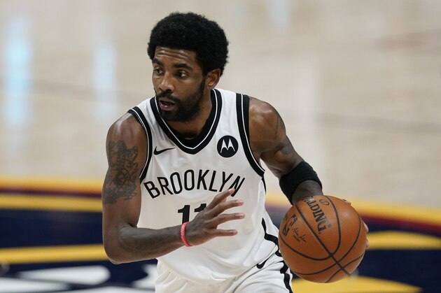 Brooklyn Nets guard Kyrie Irving (11) in the second half of an NBA basketball game Saturday, May 8, 2021, in Denver. (AP Photo/David Zalubowski)