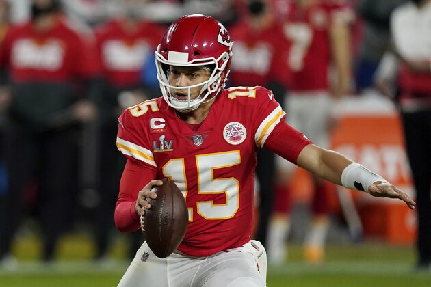 Kansas City Chiefs quarterback Patrick Mahomes (15) scrambles during the second half of the NFL Super Bowl 55 football game against the Tampa Bay Buccaneers, Sunday, Feb. 7, 2021, in Tampa, Fla. The Tampa Bay Buccaneers defeated the Kansas City Chiefs 31-9. (AP Photo/Steve Luciano)