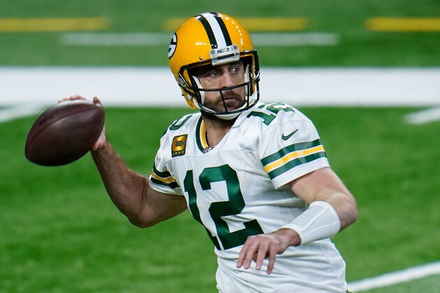 Green Bay Packers quarterback Aaron Rodgers throws against the Detroit Lions during the second half of an NFL football game, Sunday, Dec. 13, 2020, in Detroit. (AP Photo/Paul Sancya)
