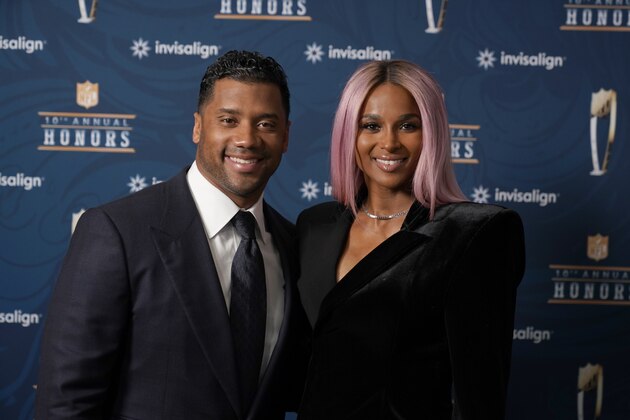 Seattle Seahawks quarterback Russell Wilson and his wife Ciara pose for a photo at the NFL Honors ceremony as part of Super Bowl 55 Friday, Feb. 5, 2021, in Tampa, Fla. (AP Photo/Charlie Riedel)