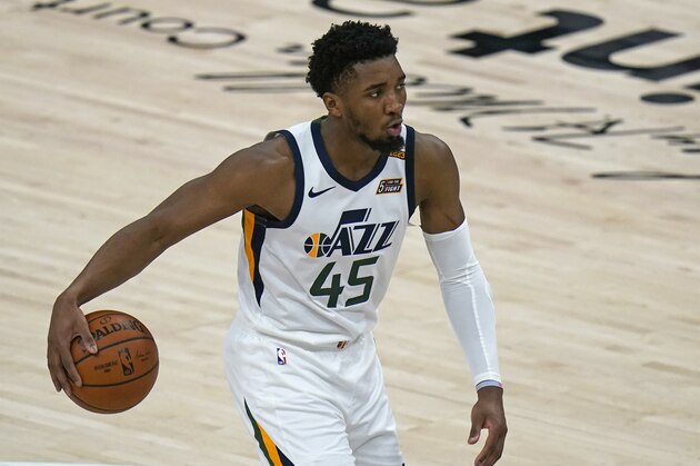 Utah Jazz guard Donovan Mitchell (45) brings the ball up court against the Indiana Pacers in the first half during an NBA basketball game Friday, April 16, 2021, in Salt Lake City. (AP Photo/Rick Bowmer)