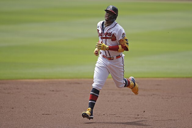 Atlanta Braves' Ronald Acuna Jr. runs the bases after hitting a home run off Toronto Blue Jays' Ross Stripling in the first inning of a baseball game Thursday, May 13, 2021, in Atlanta. (AP Photo/Ben Margot)