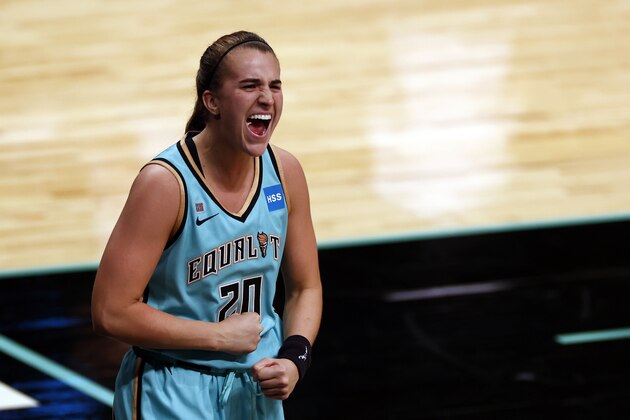 New York Liberty guard Sabrina Ionescu (20) reacts after making the game winning basket against the Indiana Fever during a WNBA basketball game, Friday, May 14, 2021, in New York. (AP Photo/Adam Hunger)