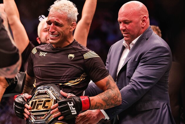 Charles Oliveira (left) is the new UFC lightweight champion