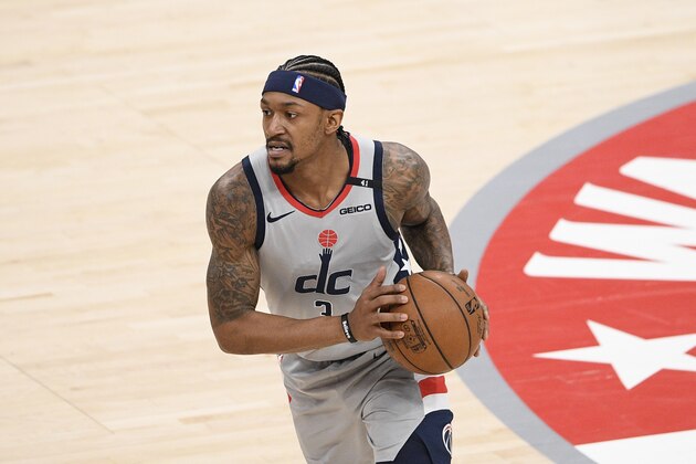 Washington Wizards guard Bradley Beal dribbles the ball during the first half of an NBA basketball game against the Charlotte Hornets, Sunday, May 16, 2021, in Washington. (AP Photo/Nick Wass)