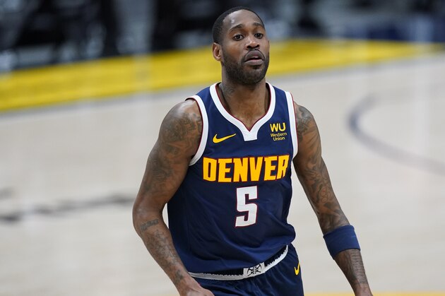 Denver Nuggets forward Will Barton (5) in the second overtime of an NBA basketball game Monday, April 19, 2021, in Denver. The Nuggets prevailed 139-137. (AP Photo/David Zalubowski)