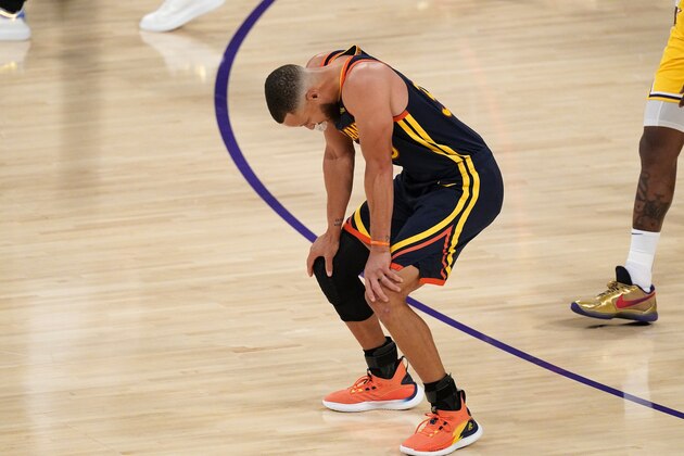 Golden State Warriors guard Stephen Curry reacts as time runs out after the Lakers defeated the Warriors 103-100 in an NBA basketball Western Conference Play-In game Wednesday, May 19, 2021, in Los Angeles. (AP Photo/Mark J. Terrill)