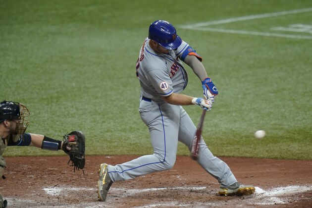 New York Mets' Pete Alonso flies out against the Tampa Bay Rays during the fifth inning of a baseball game Saturday, May 15, 2021, in St. Petersburg, Fla. (AP Photo/Chris O'Meara)