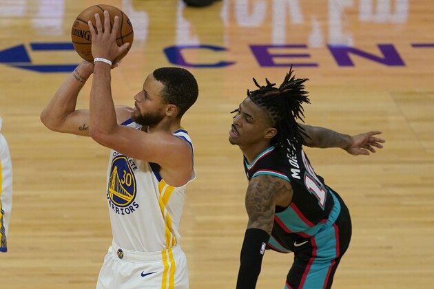 Golden State Warriors guard Stephen Curry (30) shoots a 3-point basket in front of Memphis Grizzlies guard Ja Morant during the second half of an NBA basketball game in San Francisco, Sunday, May 16, 2021. (AP Photo/Jeff Chiu)