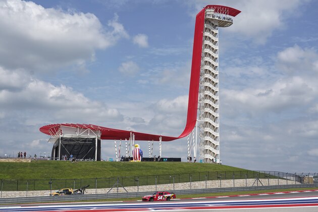 Kyle Busch drives his car past the viewing tower during practice for Saturday's NASCAR Xfinity Series auto race at the Circuit of the Americas in Austin, Texas, Friday, May 21, 2021. (AP Photo/Chuck Burton)