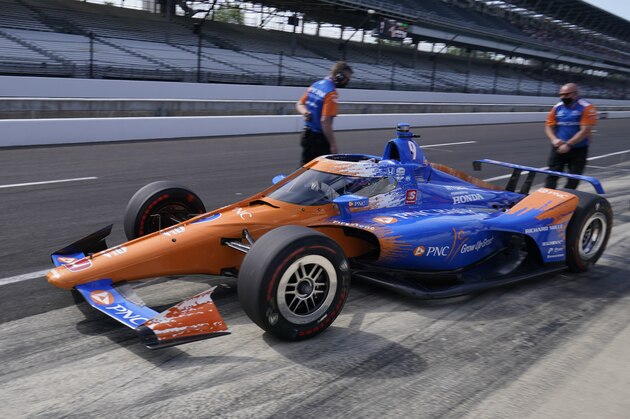 Scott Dixon, of New Zealand, leaves the pits during practice for the Indianapolis 500 auto race at Indianapolis Motor Speedway, Friday, May 21, 2021, in Indianapolis. (AP Photo/Darron Cummings)