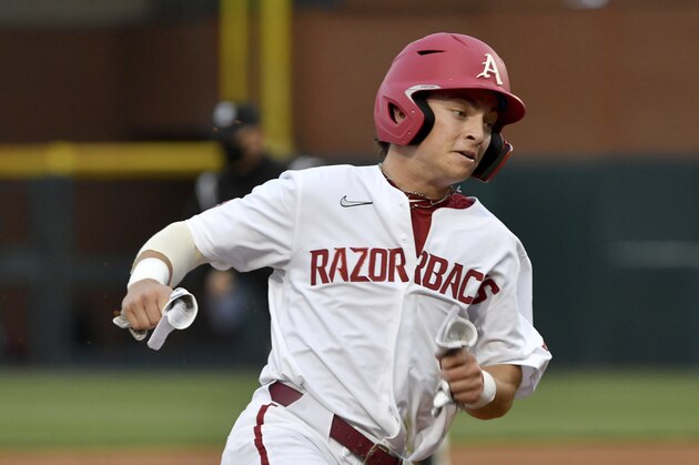 Arkansas baserunner Zac White (16) against Pine Bluff during an NCAA baseball game on Tuesday, April 13, 2021, in Fayetteville, Ark. (AP Photo/Michael Woods).