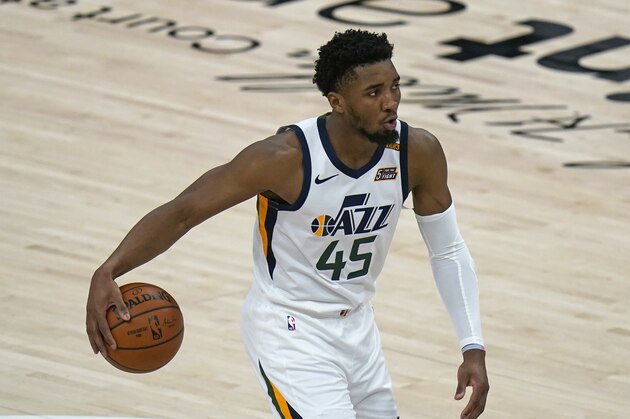 Utah Jazz guard Donovan Mitchell (45) brings the ball up court against the Indiana Pacers in the first half during an NBA basketball game Friday, April 16, 2021, in Salt Lake City. (AP Photo/Rick Bowmer)