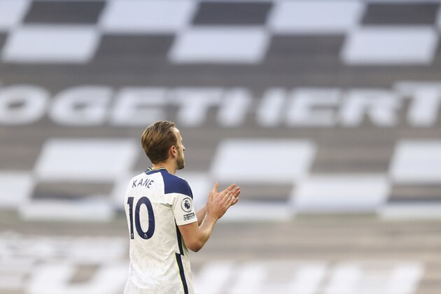 Tottenham's Harry Kane applauds to supporters at the end of the English Premier League soccer match between Tottenham Hotspur and Aston Villa at the Tottenham Hotspur Stadium in London, Wednesday, May 19, 2021. (Richard Heathcote/Pool via AP)