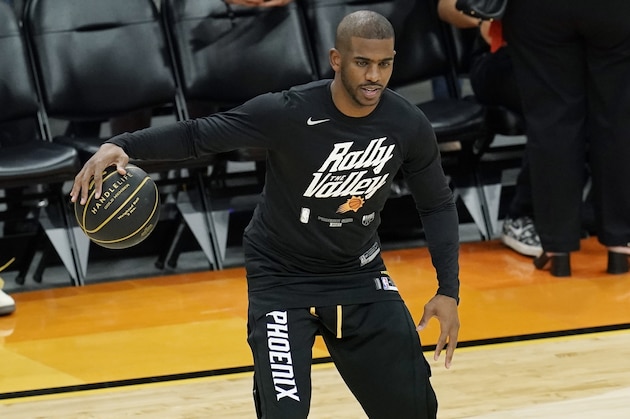 Phoenix Suns guard Chris Paul warms up prior to Game 1 of their NBA basketball first-round playoff series against the Los Angeles Lakers Sunday, May 23, 2021, in Phoenix. (AP Photo/Ross D. Franklin)