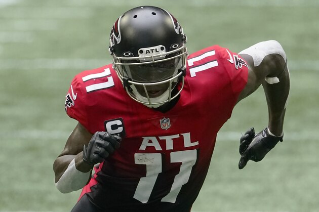 Atlanta Falcons wide receiver Julio Jones (11) works against the Detroit Lions during the second half of an NFL football game, Sunday, Oct. 25, 2020, in Atlanta. (AP Photo/John Bazemore)