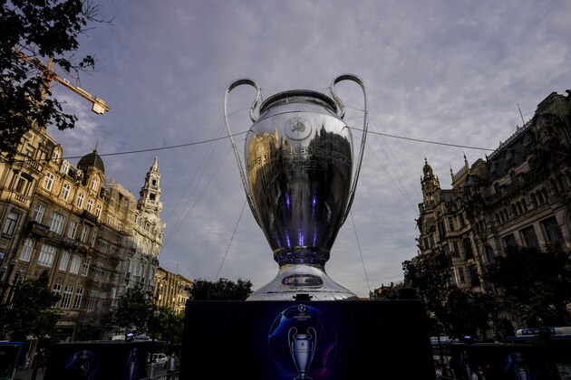 A giant replica of the UEFA Champions League trophy is displayed in Porto, Portugal, Thursday, May 27, 2021. Manchester City will play against Chelsea in the Champions League final on Saturday. (AP Photo/Manu Fernandez)