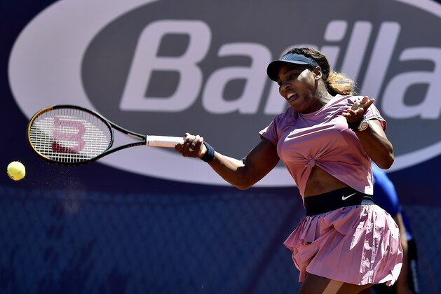 Serena Williams of the United States returns the ball to Italy's Lisa Pigato during their match at the Emilia Romagna Open tennis tournament, in Parma, Monday, May 17, 2021. Serena Williams earned her first victory in more than three months by beating 17-year-old qualifier Lisa Pigato 6-3, 6-2 in the first round of the Emilia-Romagna Open. Williams accepted a wild-card invitation for the Parma tournament after losing her opening match at the Italian Open last week. (AP Photo/Marco Vasini)