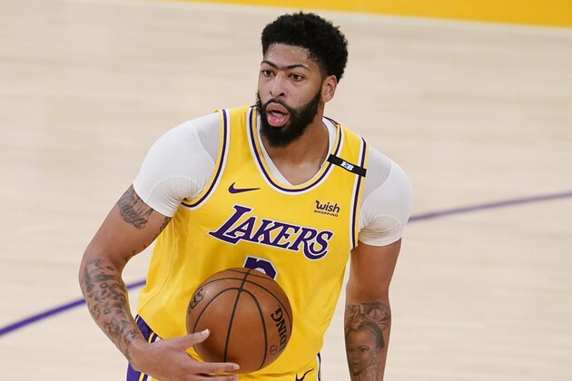 Los Angeles Lakers forward Anthony Davis holds the ball during Game 3 of an NBA basketball first-round playoff series against the Phoenix Suns Thursday, May 27, 2021, in Los Angeles. (AP Photo/Marcio Jose Sanchez)