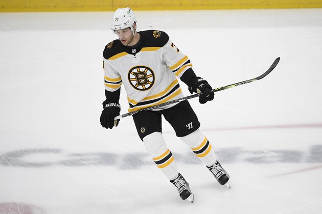 Boston Bruins left wing Taylor Hall (71) warms up before Game 5 of an NHL hockey Stanley Cup first-round playoff series against the Washington Capitals, Sunday, May 23, 2021, in Washington. (AP Photo/Nick Wass)