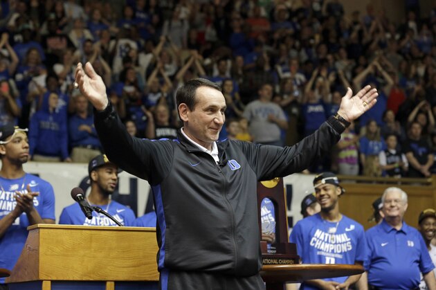 Duke coach Mike Krzyzewski recognizes the crowd during a homecoming celebration for the national championship Duke basketball team at Cameron Indoor Stadium Tuesday, April 7, 2015 in Durham, N.C. Duke defeated Wisconsin Monday night in the NCAA Final Four tournament championship game. (AP Photo/Gerry Broome)