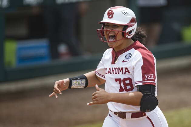 Oklahoma's Jocelyn Alo (78) celebrates hitting a solo home run during an NCAA softball game against Washington on Friday, May 28, 2021, in Norman, Okla. Oklahoma won 4-2. (AP Photo/Brandon Wade)