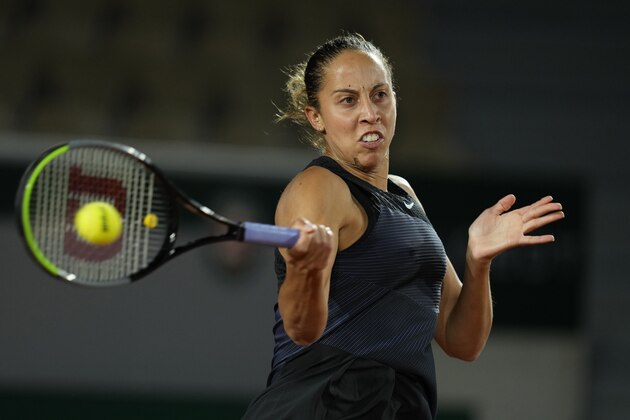 United States's Madison Keys returns the ball to Oceane Dodin of France during their first round match of the French Open tennis tournament at the Roland Garros stadium Sunday, May 30, 2021 in Paris. (AP Photo/Thibault Camus)