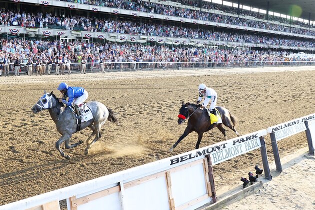 ELMONT, NEW YORK - JUNE 05:  Essential Quality with Luis Saez up wins the 153rd running of the Belmont Stakes as Hot Rod Charlie with Flavien Prat up finishes second  at Belmont Park on June 05, 2021 in Elmont, New York. (Photo by Al Bello/Getty Images)
