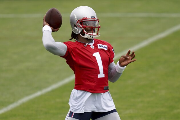 New England Patriots quarterback Cam Newton throws a pass during NFL football practice in Foxborough, Mass., Friday, June 4, 2021. (AP Photo/Mary Schwalm)