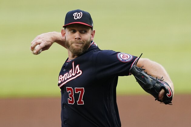 Washington Nationals starting pitcher Stephen Strasburg (37) delivers ion the first inning of a baseball game against the Atlanta Braves Tuesday, June 1, 2021, in Atlanta. (AP Photo/John Bazemore)