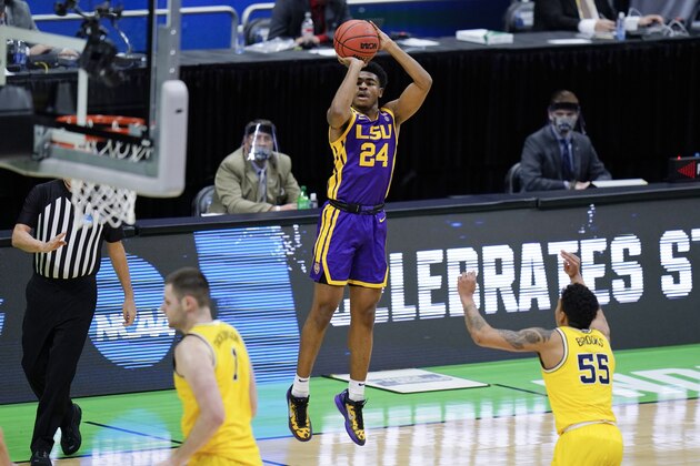 LSU guard Cameron Thomas (24) shoots over Michigan guard Eli Brooks (55) during the first half of a second-round game in the NCAA men's college basketball tournament at Lucas Oil Stadium Monday, March 22, 2021, in Indianapolis. (AP Photo/AJ Mast)