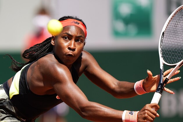 United States's Coco Gauff plays a return to Tunisia's Ons Jabeur during their fourth round match on day 9, of the French Open tennis tournament at Roland Garros in Paris, France, Monday, June 7, 2021. (AP Photo/Michel Euler)