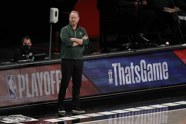 Milwaukee Bucks head coach Mike Budenholzer looks on against the Brooklyn Nets during the first half of Game 1 of an NBA basketball second-round playoff series Saturday, June 5, 2021, in New York. (AP Photo/Adam Hunger)