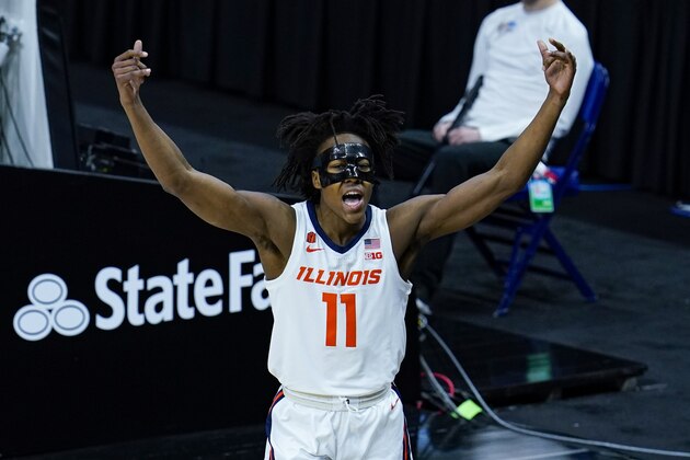 Illinois guard Ayo Dosunmu (11) celebrates in the first half of an NCAA college basketball game against Rutgers at the Big Ten Conference tournament in Indianapolis, Friday, March 12, 2021. (AP Photo/Michael Conroy)