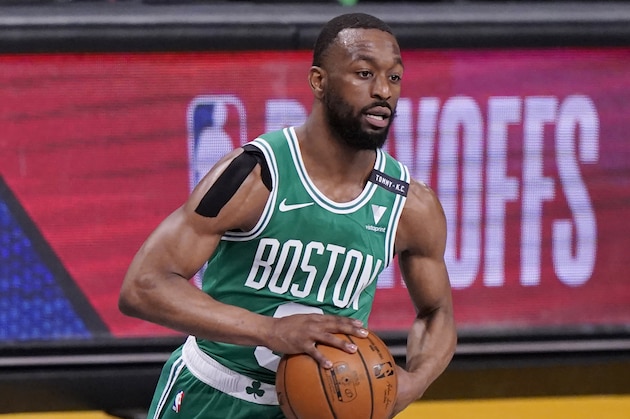Boston Celtics guard Kemba Walker (8) looks to pass during the first quarter of Game 2 of an NBA basketball first-round playoff series against the Brooklyn Nets, Tuesday, May 25, 2021, in New York. (AP Photo/Kathy Willens)