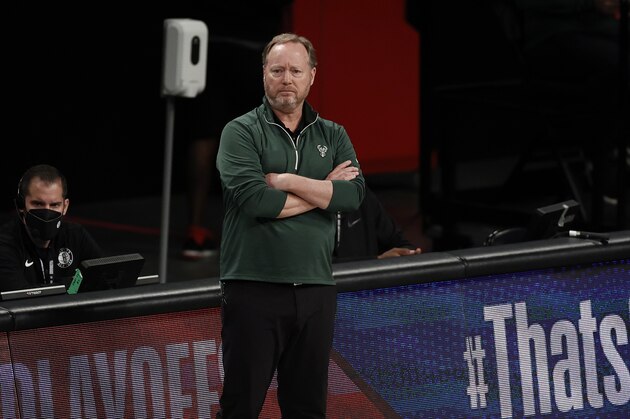 Milwaukee Bucks head coach Mike Budenholzer looks on against the Brooklyn Nets during the first half of Game 1 of an NBA basketball second-round playoff series Saturday, June 5, 2021, in New York. (AP Photo/Adam Hunger)