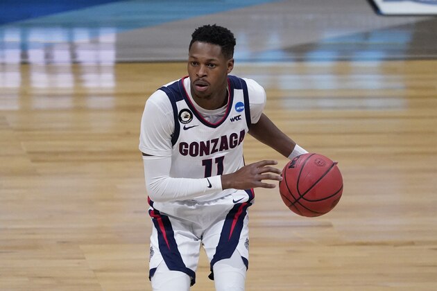 Gonzaga guard Joel Ayayi (11) drives up court during the second half of an Elite 8 game against Southern California in the NCAA men's college basketball tournament at Lucas Oil Stadium, Tuesday, March 30, 2021, in Indianapolis. (AP Photo/Darron Cummings)